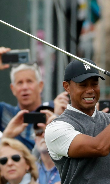 Woods posts 1st round under par at US Open in 7 years